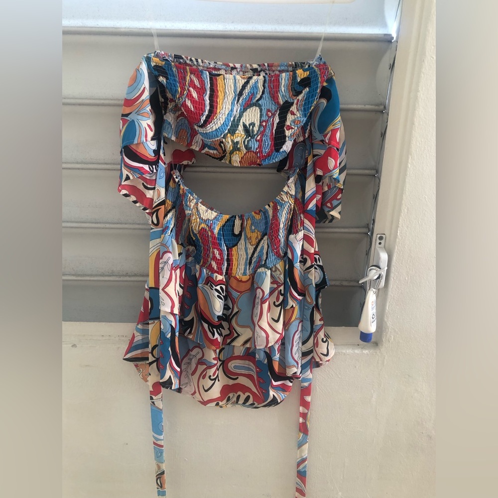 First picture is to show how it looks. THIS IS THE BLUE colorful shirt and skirt